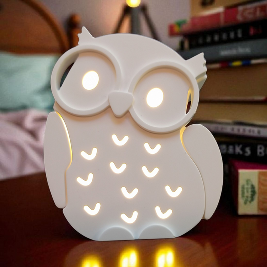 Eule aus Keramikguss mit Lichterkette