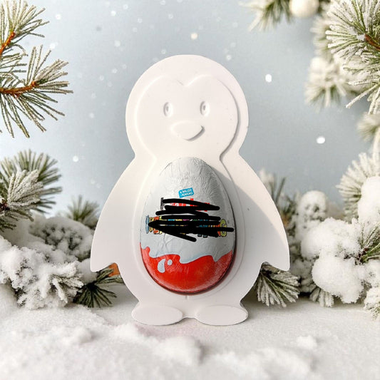 Pinguin aus Keramikguss mit Aussparung für Schokoei