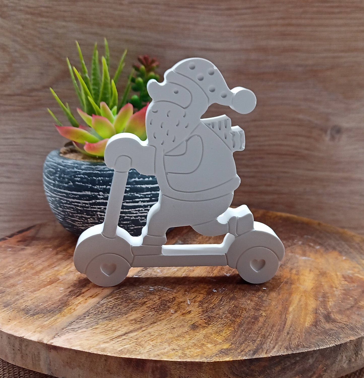 Weihnachtsmann auf Roller