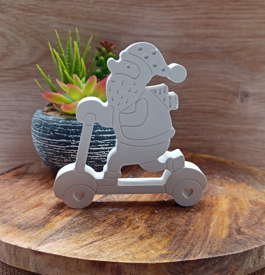 Weihnachtsmann auf Roller
